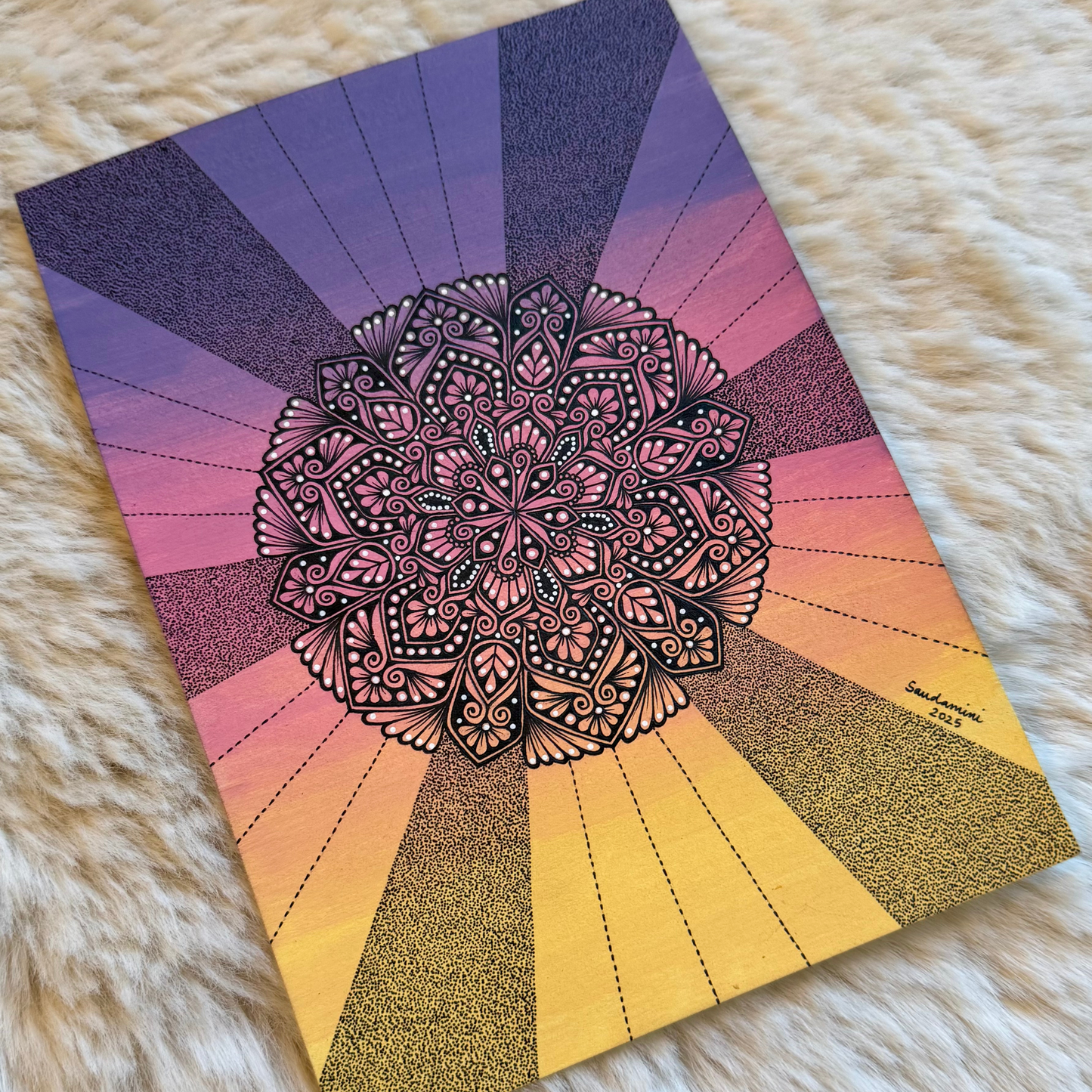 Colorful mandala design on a textured surface