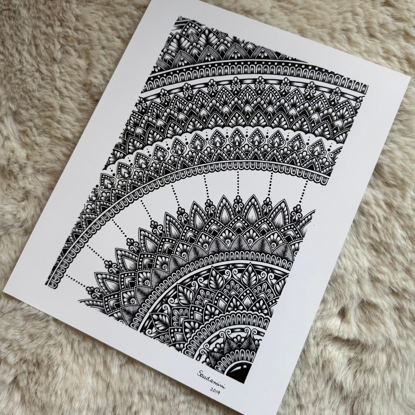 Hand-drawn mandala arc by Saudamini Madra in black ink on Bristol paper, detail view of band patterning