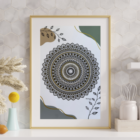 Framed mandala art print on a wall with decorative items below.