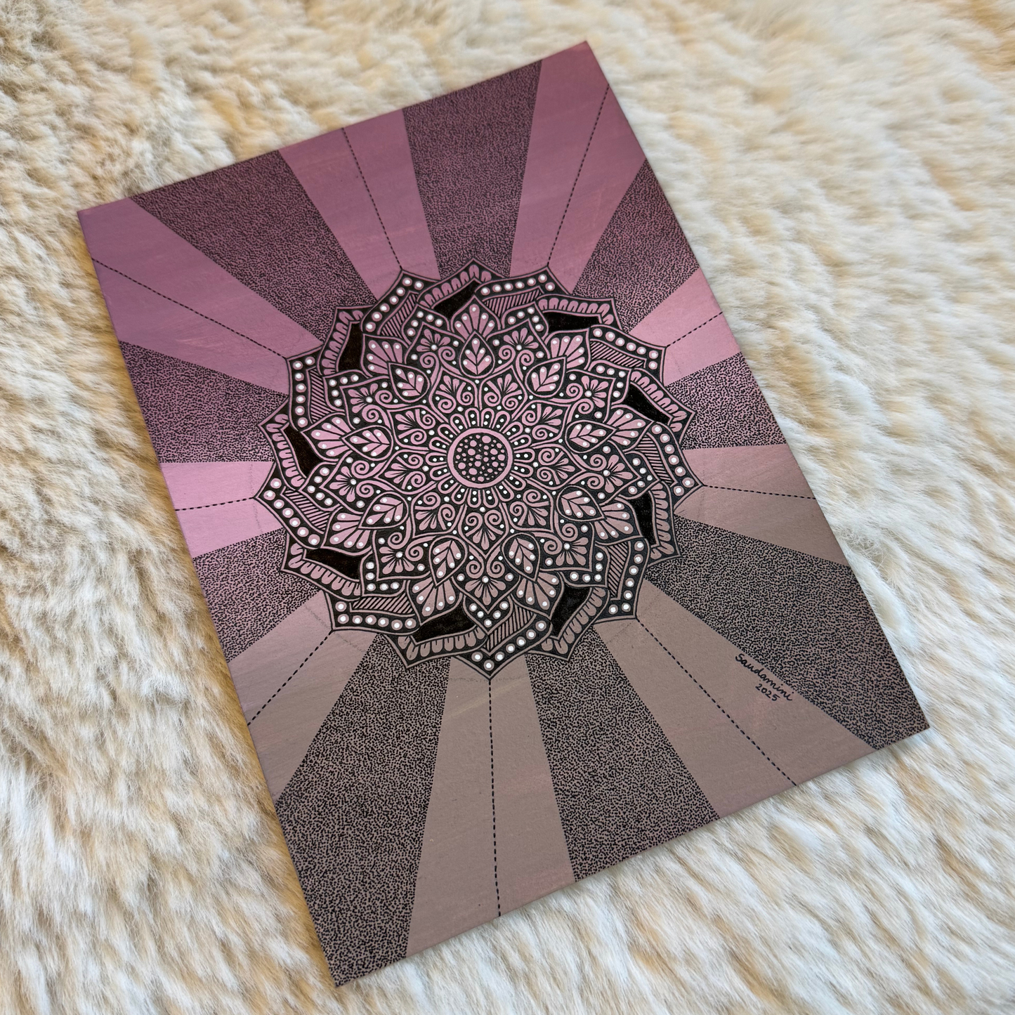 Decorative mandala design on a textured surface