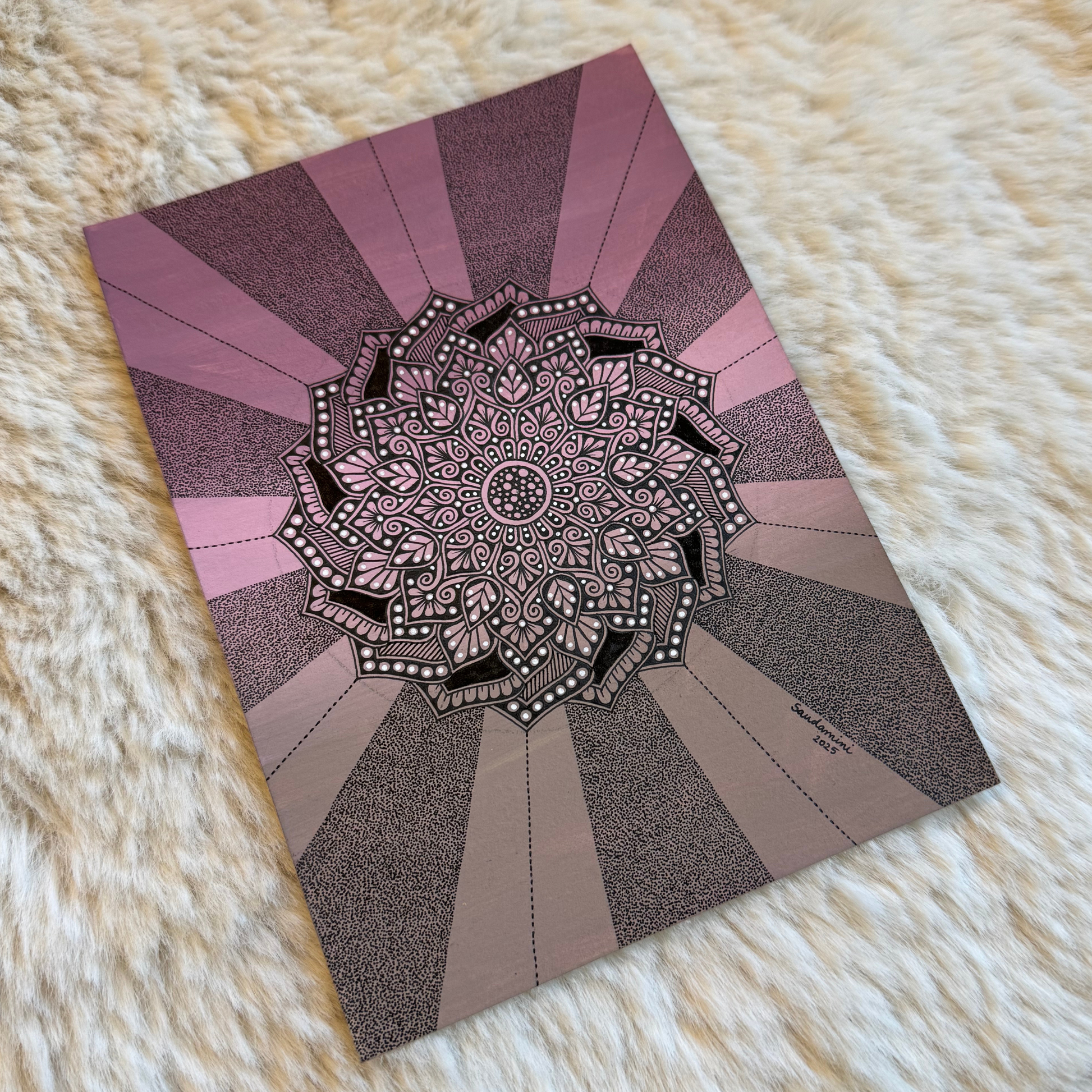 Decorative mandala design on a textured surface