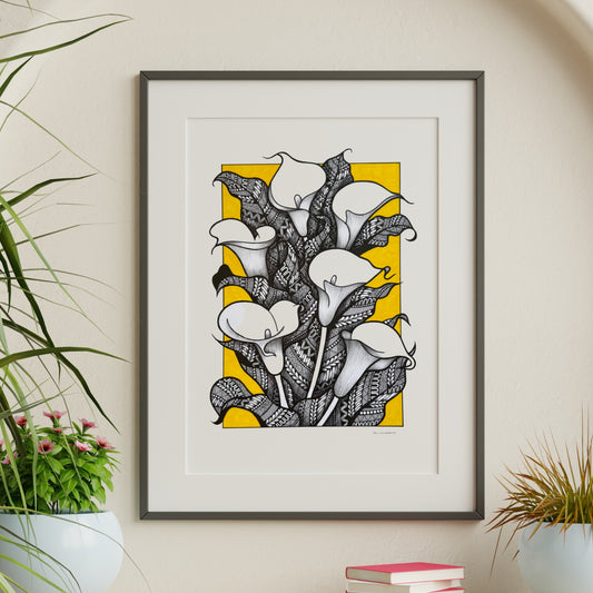 Composite mockup of Lilies That Kept Vigil Zentangle by Saudamini Madra, calla lilies in black ink with yellow ground on Bristol paper, shown framed in a styled room