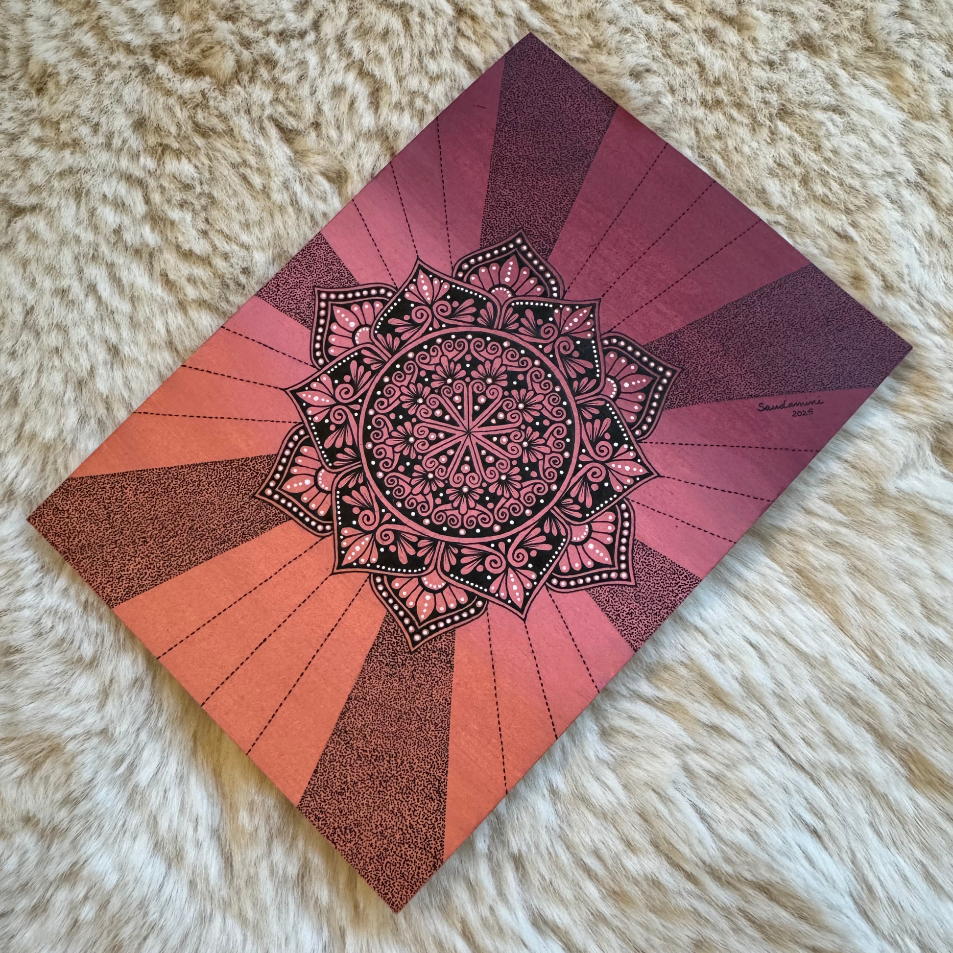 Decorative mandala design on a textured surface