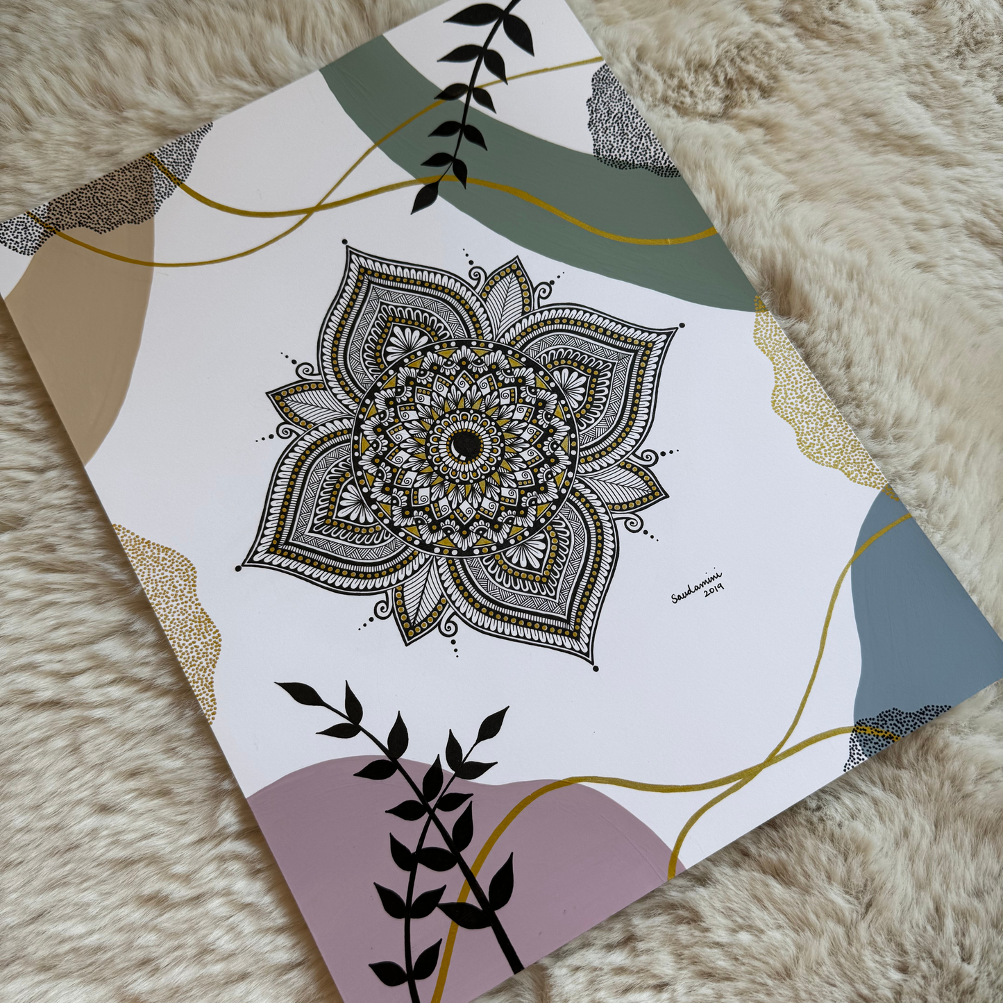 Decorative mandala design on a fluffy surface