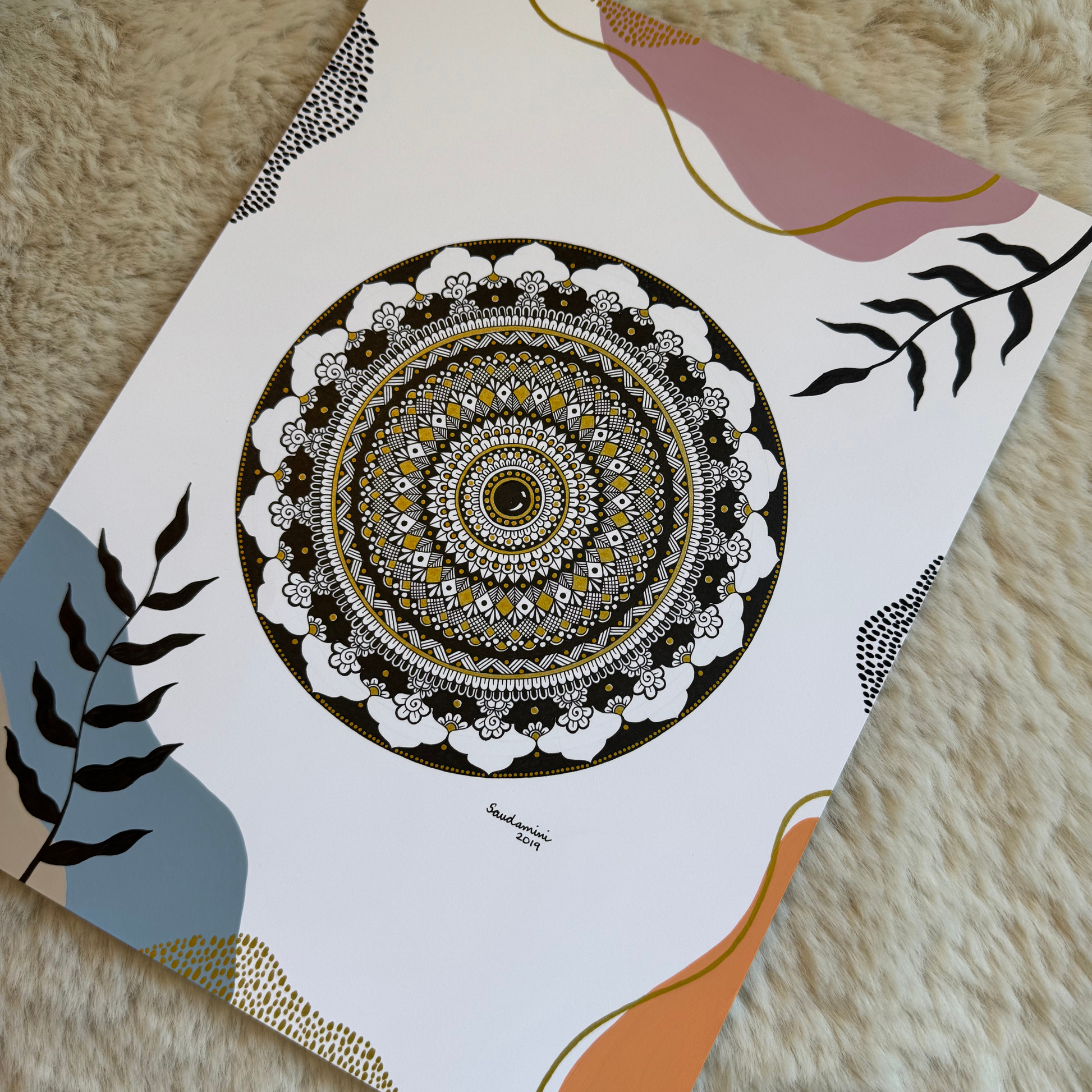 Silent coin mandala theme artwork on a furry surface