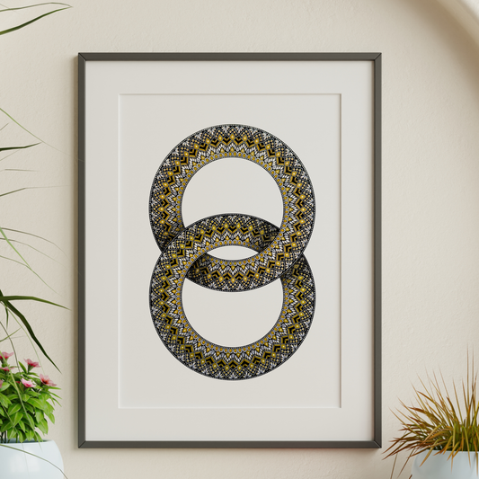 Zentangle design within two interlocking rings artwork hanging on a wall with decorative plants