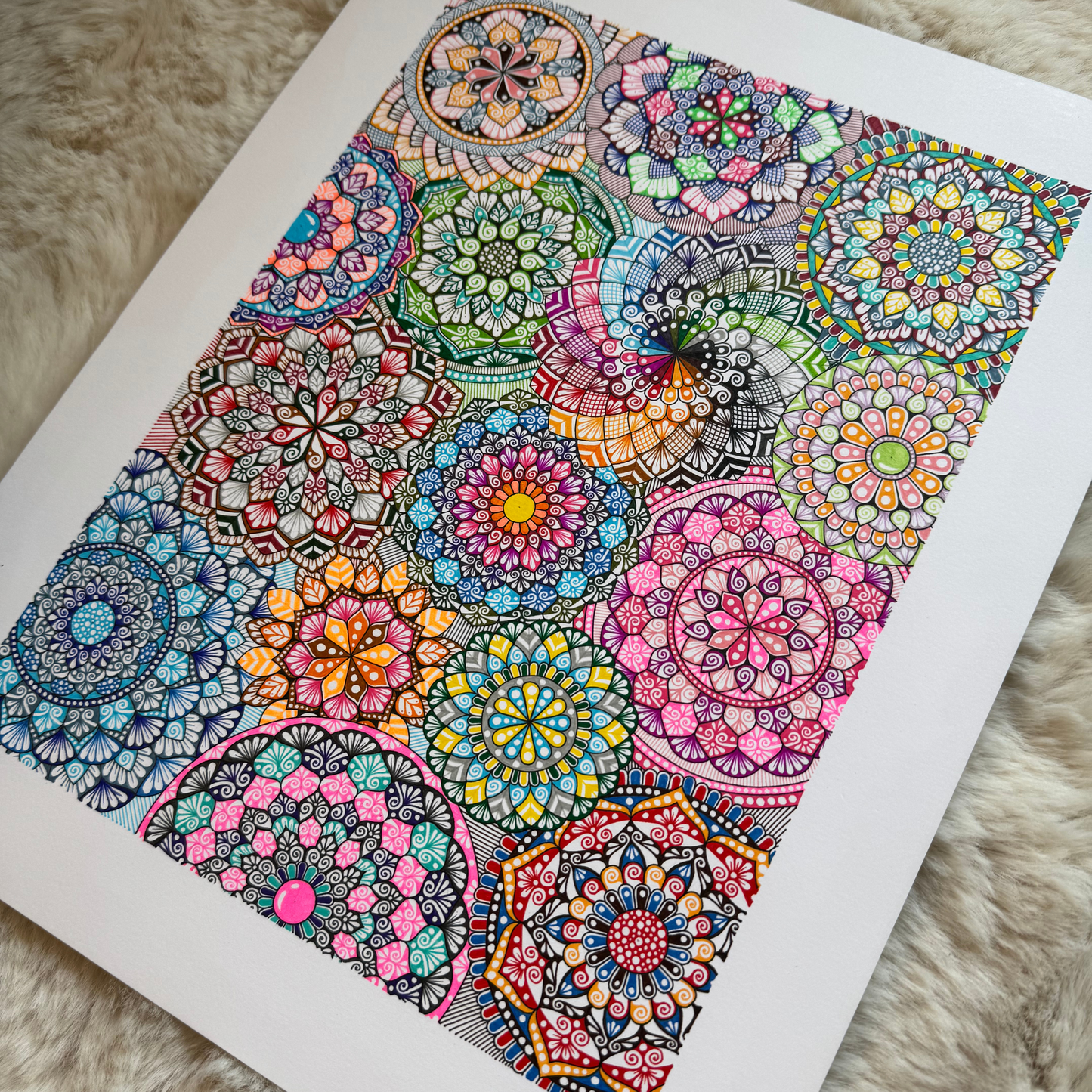 Colorful mandala design on a white background