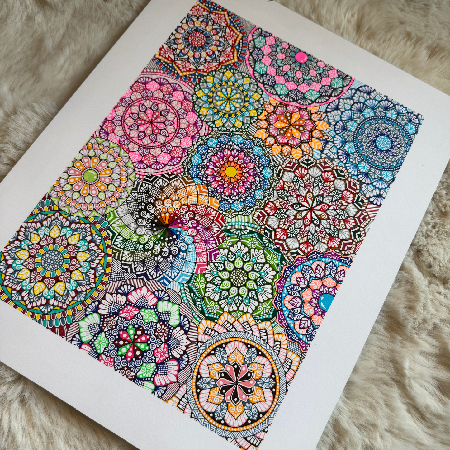 Colorful mandala design on a white background