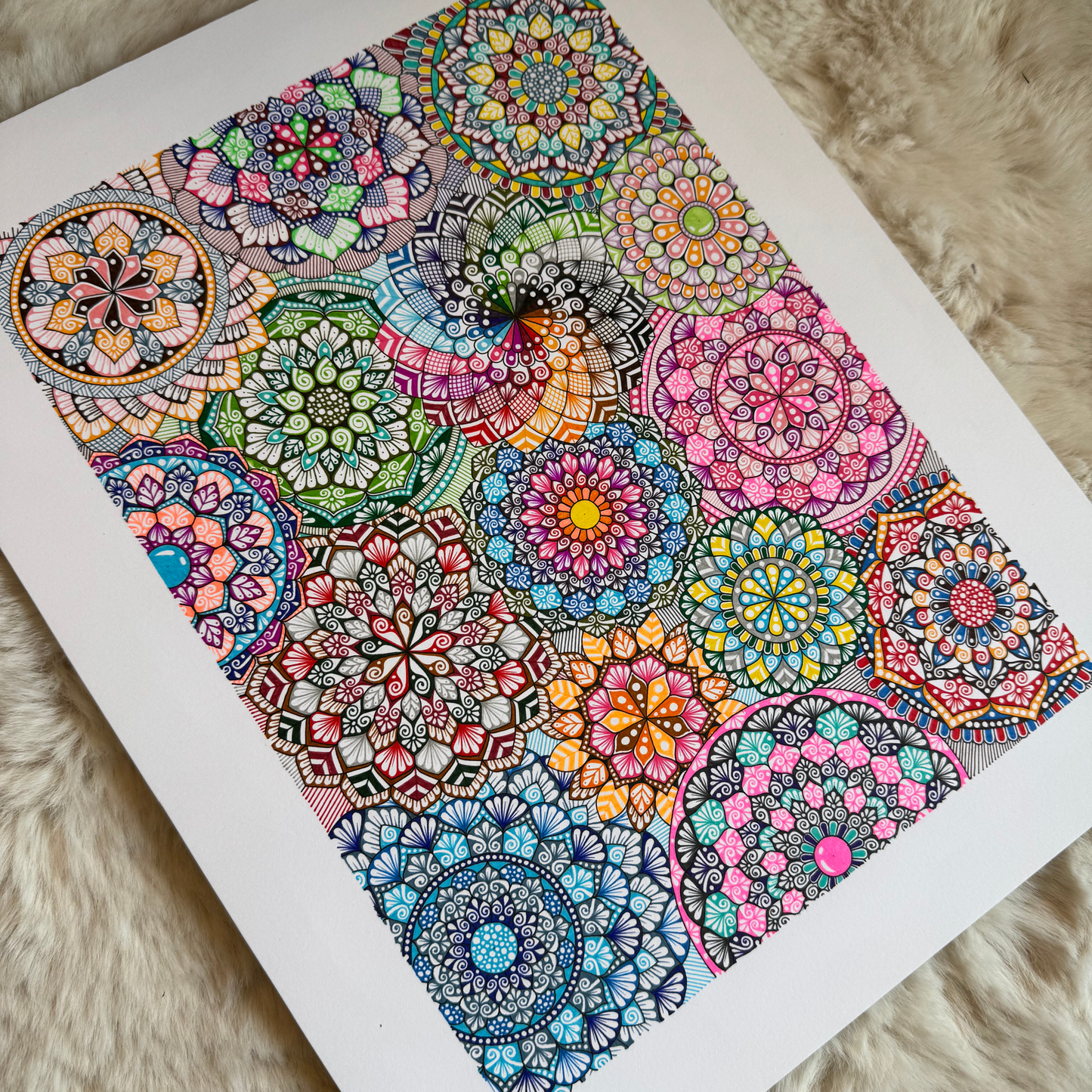 Colorful mandala design on a white background